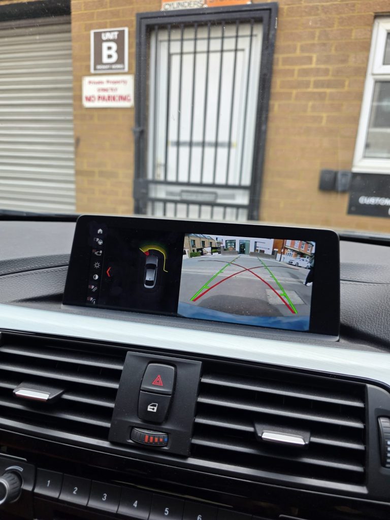 BMW reversing camera retrofit live feed on dashboard screen, Bimmer Retro UK
